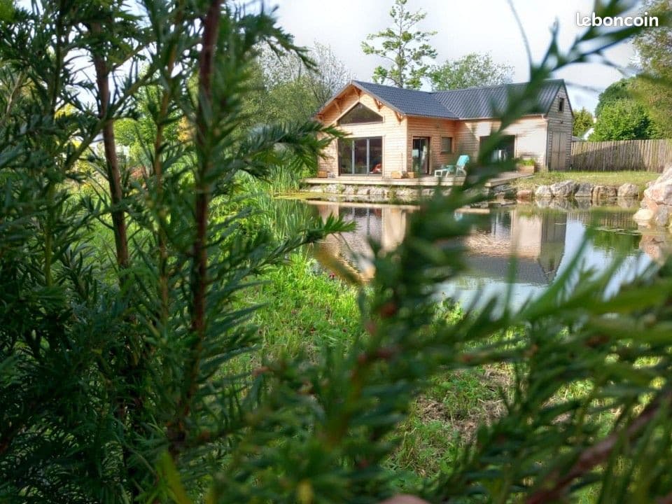 Chalet avec étang